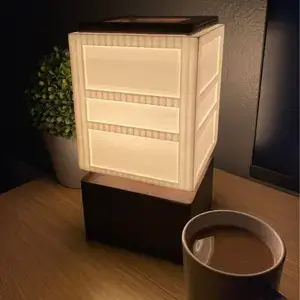 an image of s wooden lamp with a 3d printed shade